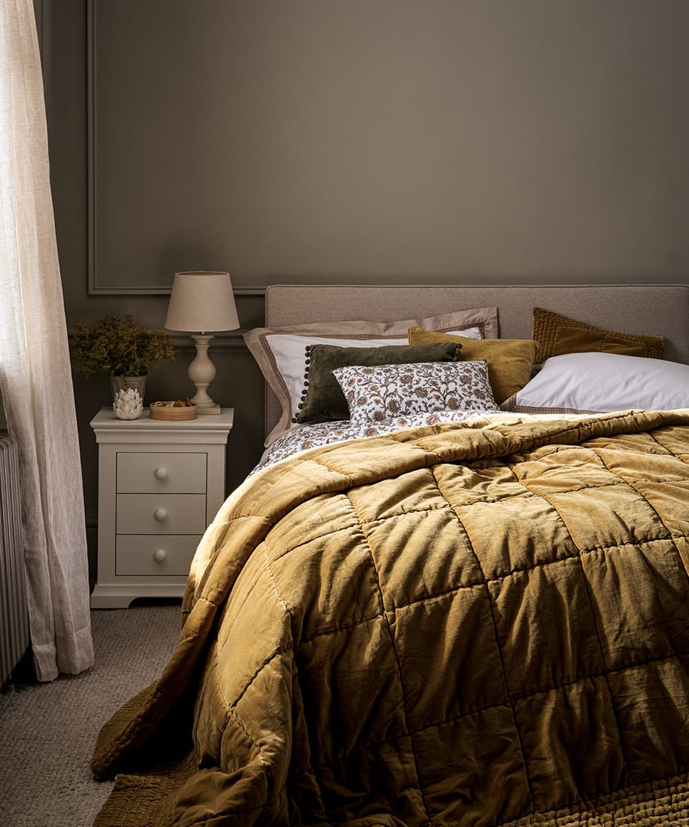 Bedroom set with 3 drawer nightstand and throw blanket